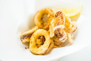 Photo de la recette Beignets de calamars à la romaine envoyée par le cuisinier