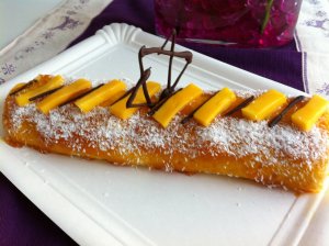 Photo de la recette Bûche Mangue - Ananas - Coco envoyée par le cuisinier
